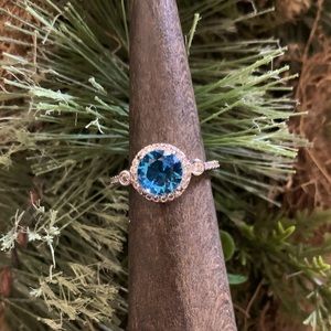 Beautiful Ring.  Lab created blue azure bi-color tourmaline. Rhodium plating